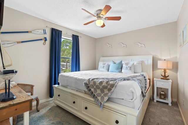 bedroom featuring ceiling fan and light carpet