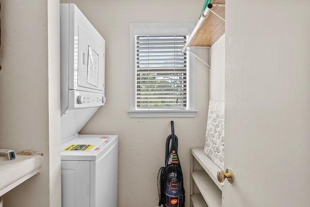 laundry room with stacked washer / dryer