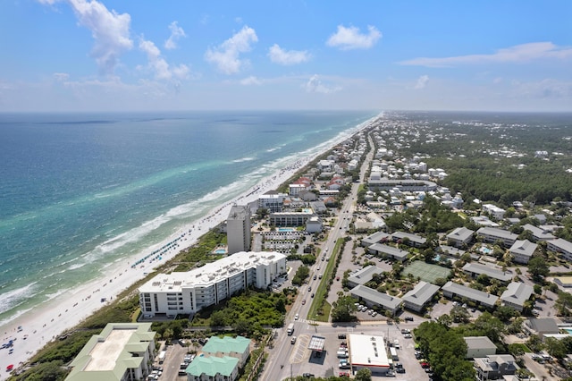 aerial view featuring a view of the beach and a water view