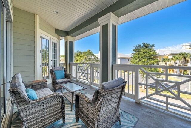 balcony featuring a porch