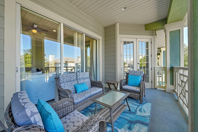 sunroom featuring french doors and ceiling fan