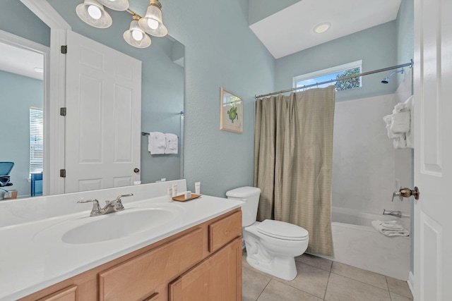 full bathroom with tile patterned flooring, vanity, toilet, and shower / tub combo