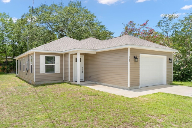 single story home with a garage and a front yard