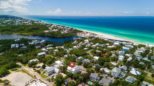 aerial view with a water view and a view of the beach