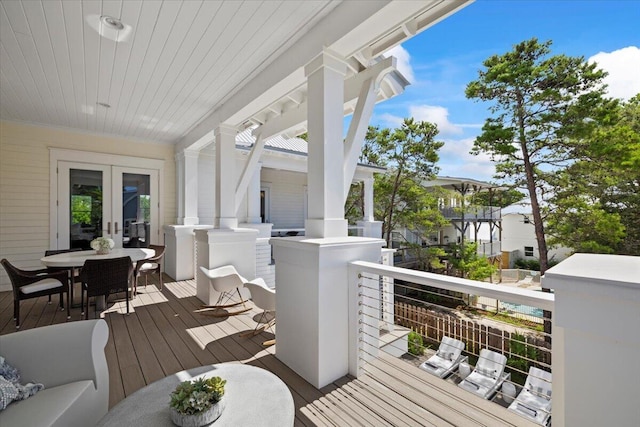 wooden terrace featuring french doors