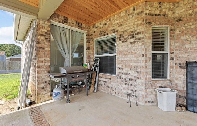 view of patio featuring a grill