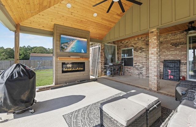 view of patio featuring a grill and ceiling fan