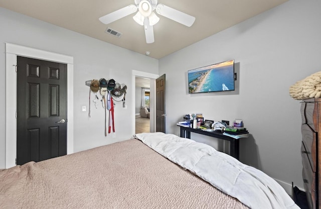 bedroom featuring ceiling fan