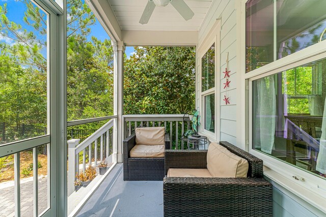 balcony featuring ceiling fan