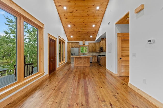 unfurnished living room featuring wood ceiling, high vaulted ceiling, and light hardwood / wood-style flooring