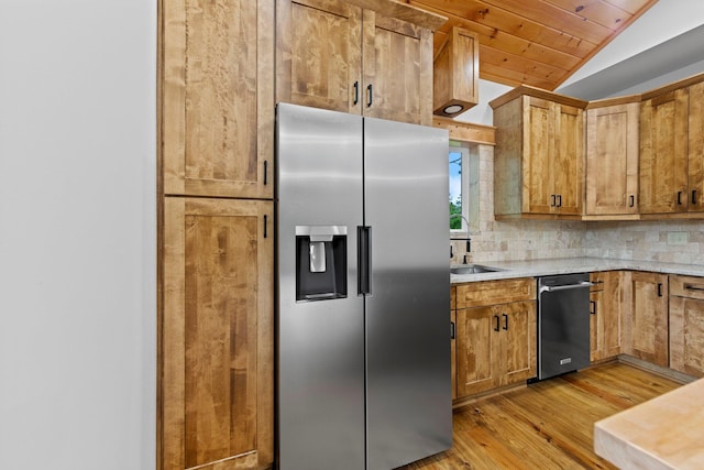 kitchen featuring tasteful backsplash, vaulted ceiling, stainless steel fridge with ice dispenser, light hardwood / wood-style flooring, and wooden ceiling