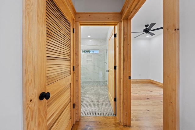 hallway with light wood-type flooring