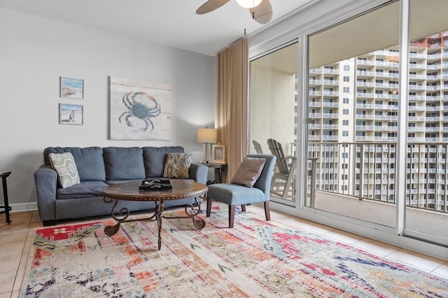 tiled living room with ceiling fan