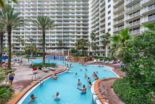 view of swimming pool featuring a patio area