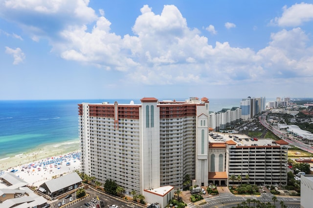 aerial view featuring a beach view and a water view