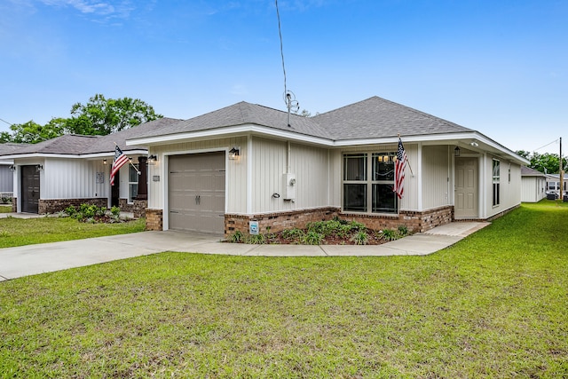 675 Passion Flower St, Defuniak Springs, FL 32433 - ranch-style home with brick siding, a garage, concrete driveway, a front yard, and roof with shingles