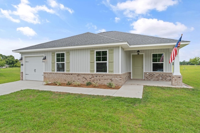 single story home with a front yard and a garage