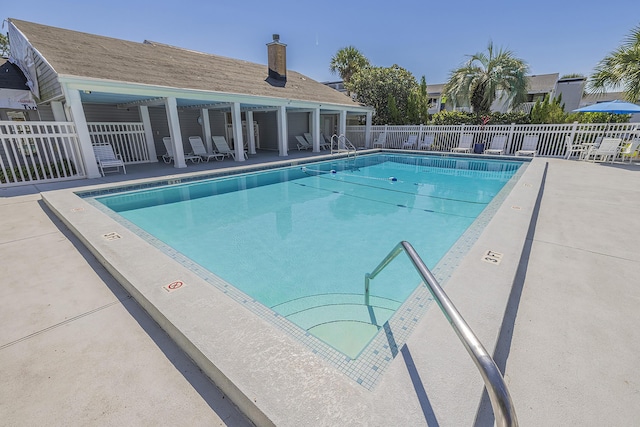 view of pool featuring a patio