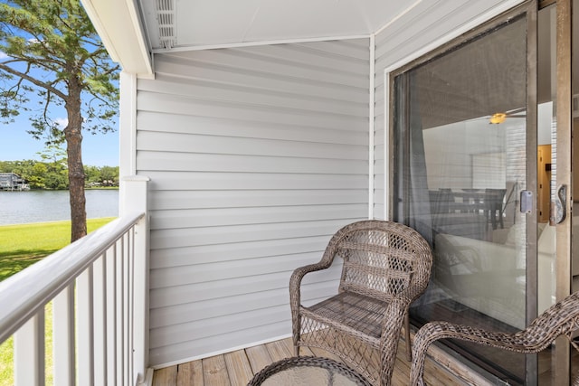 balcony featuring a water view