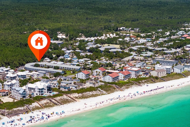 bird's eye view with a beach view and a water view