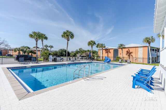 view of pool featuring a patio