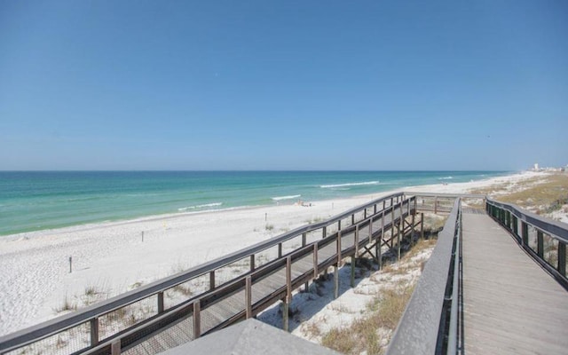 property view of water featuring a beach view