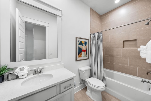 full bathroom with vanity, shower / bathtub combination with curtain, tile patterned floors, and toilet