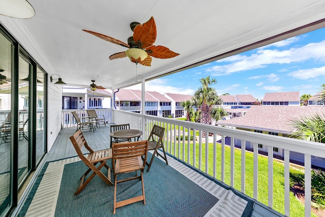 balcony featuring ceiling fan