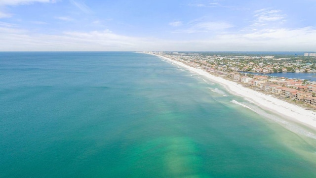 bird's eye view featuring a water view and a view of the beach