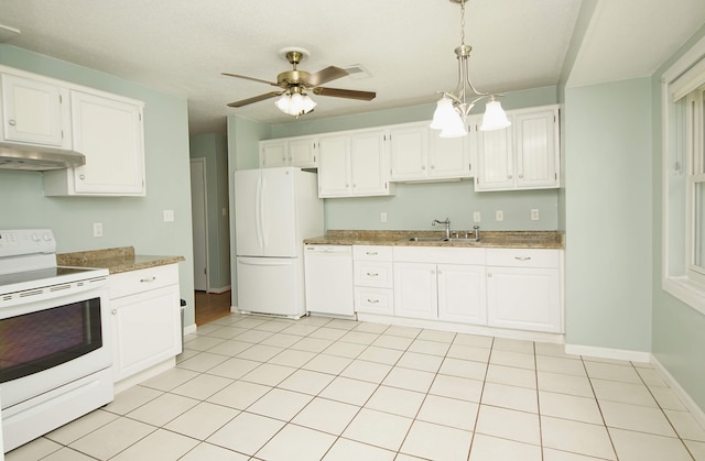 kitchen featuring ceiling fan with notable chandelier, white cabinets, white appliances, and pendant lighting