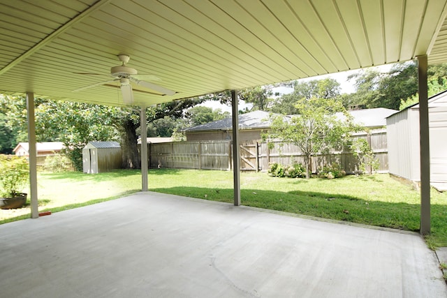 view of patio / terrace featuring a storage shed and ceiling fan