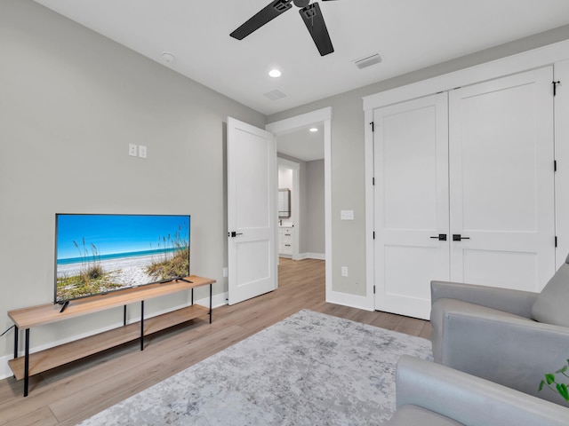 140 Sibert Ave Unit 16, Destin, FL 32541 - living room with a ceiling fan, light wood finished floors, baseboards, and recessed lighting
