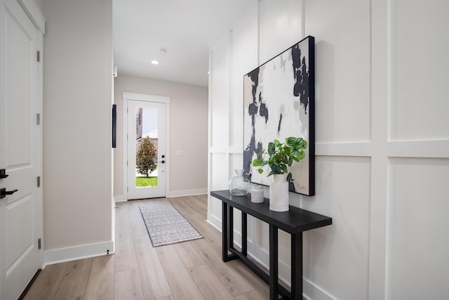 140 Sibert Ave Unit 16, Destin, FL 32541 - foyer entrance with light wood-style floors, baseboards, and recessed lighting
