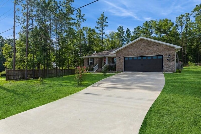 ranch-style home with a garage and a front yard