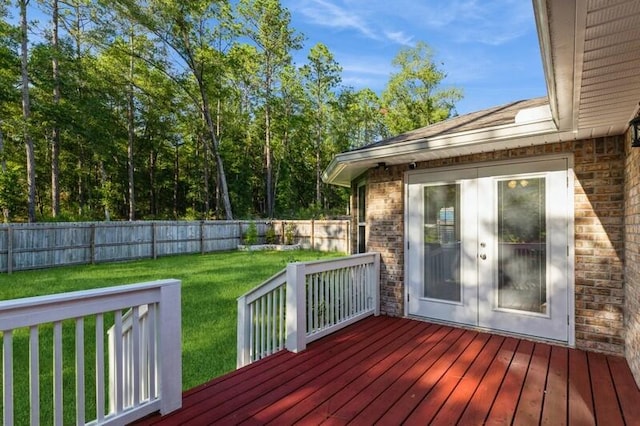 wooden deck with a yard