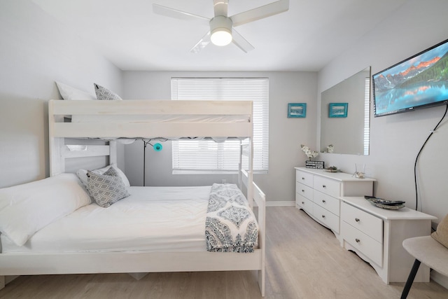 bedroom featuring ceiling fan and light wood-type flooring