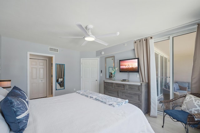 bedroom with a closet, access to outside, and ceiling fan