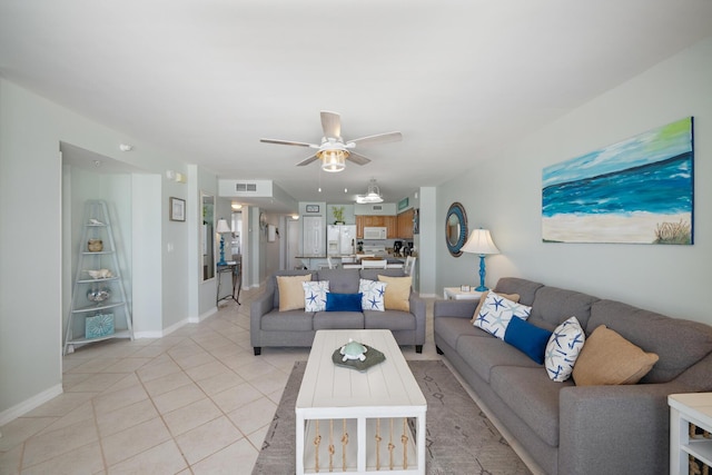 tiled living room featuring ceiling fan