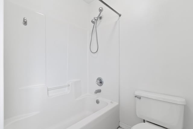 full bathroom with toilet and shower / washtub combination