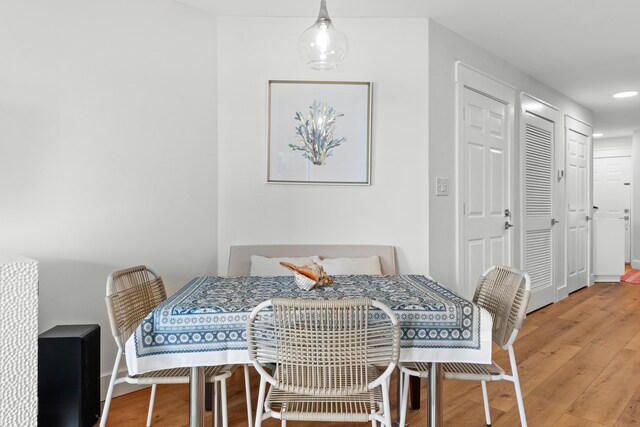 dining area featuring wood-type flooring