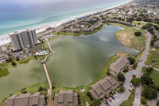 aerial view featuring a view of the beach and a water view