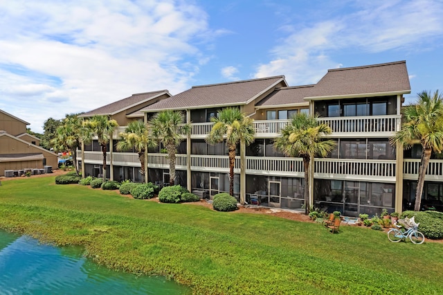 view of property with a water view