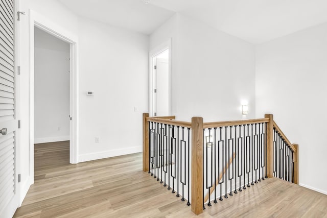 corridor featuring light hardwood / wood-style flooring