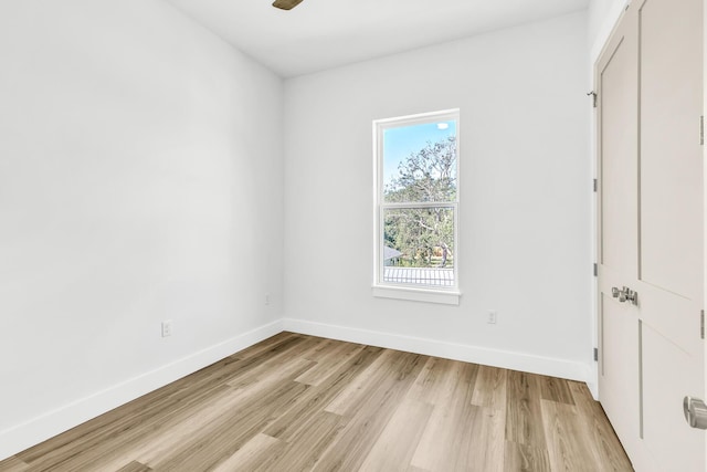 empty room with light wood-type flooring