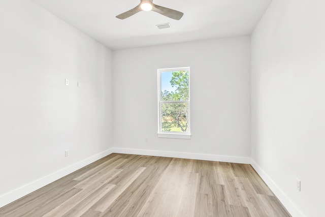 empty room featuring ceiling fan and light wood-type flooring