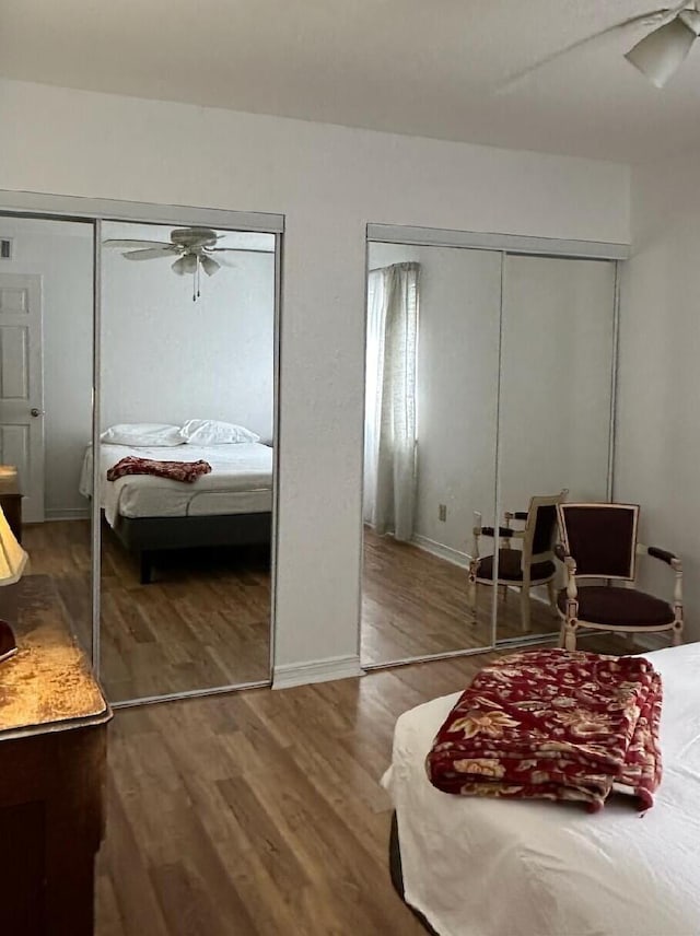 bedroom featuring hardwood / wood-style flooring and ceiling fan