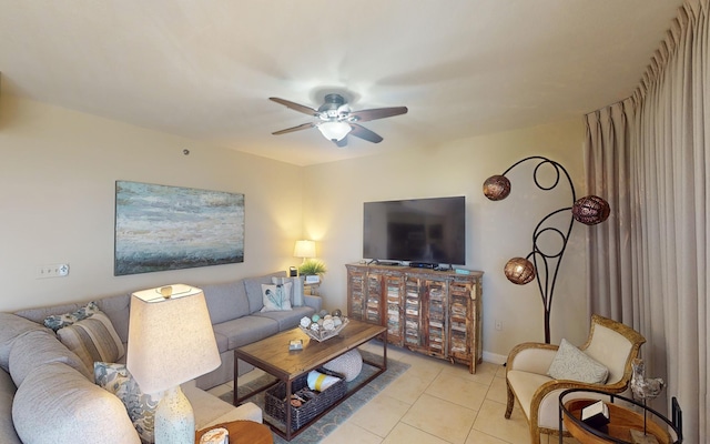 living room featuring ceiling fan and light tile patterned floors