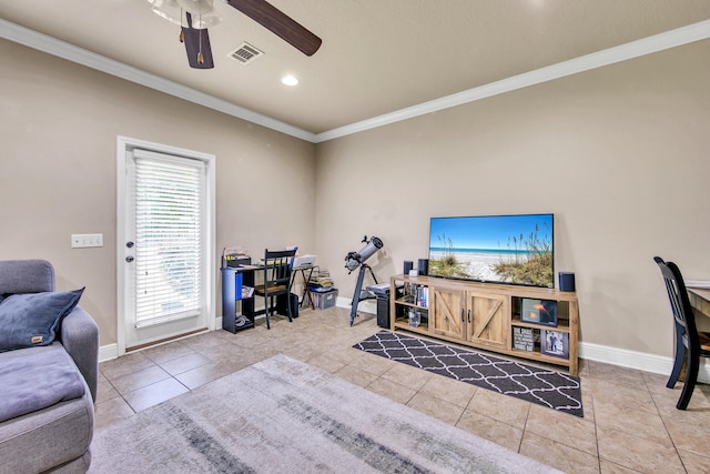 exercise room featuring crown molding, ceiling fan, and tile patterned flooring