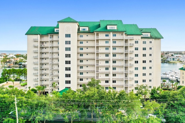 view of property with a water view