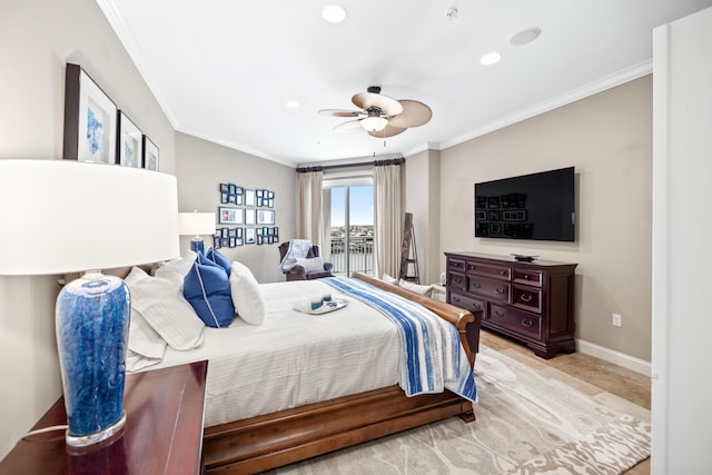 bedroom featuring ceiling fan and crown molding